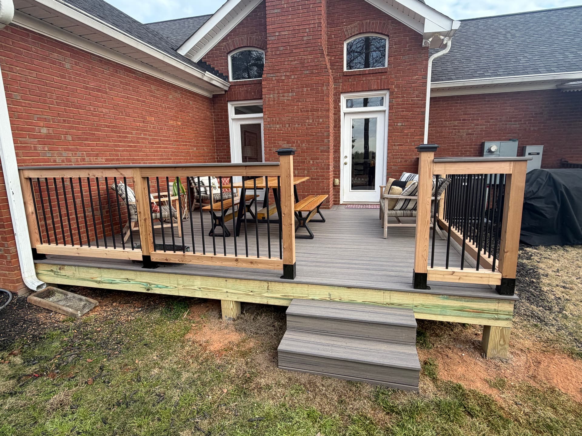 Custom Deck with Trex and Cedar Railing Brings New Life to a Backyard